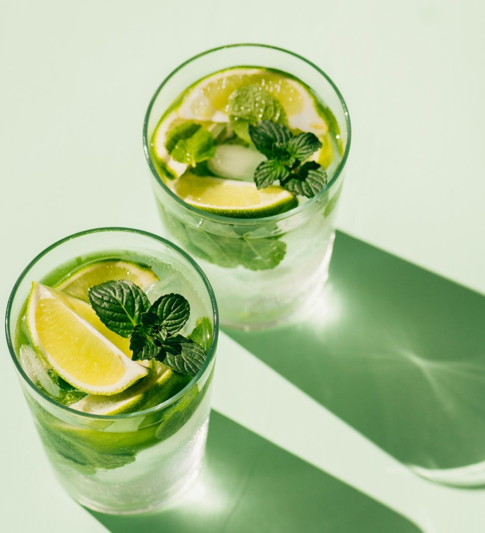 Two mint green cocktails