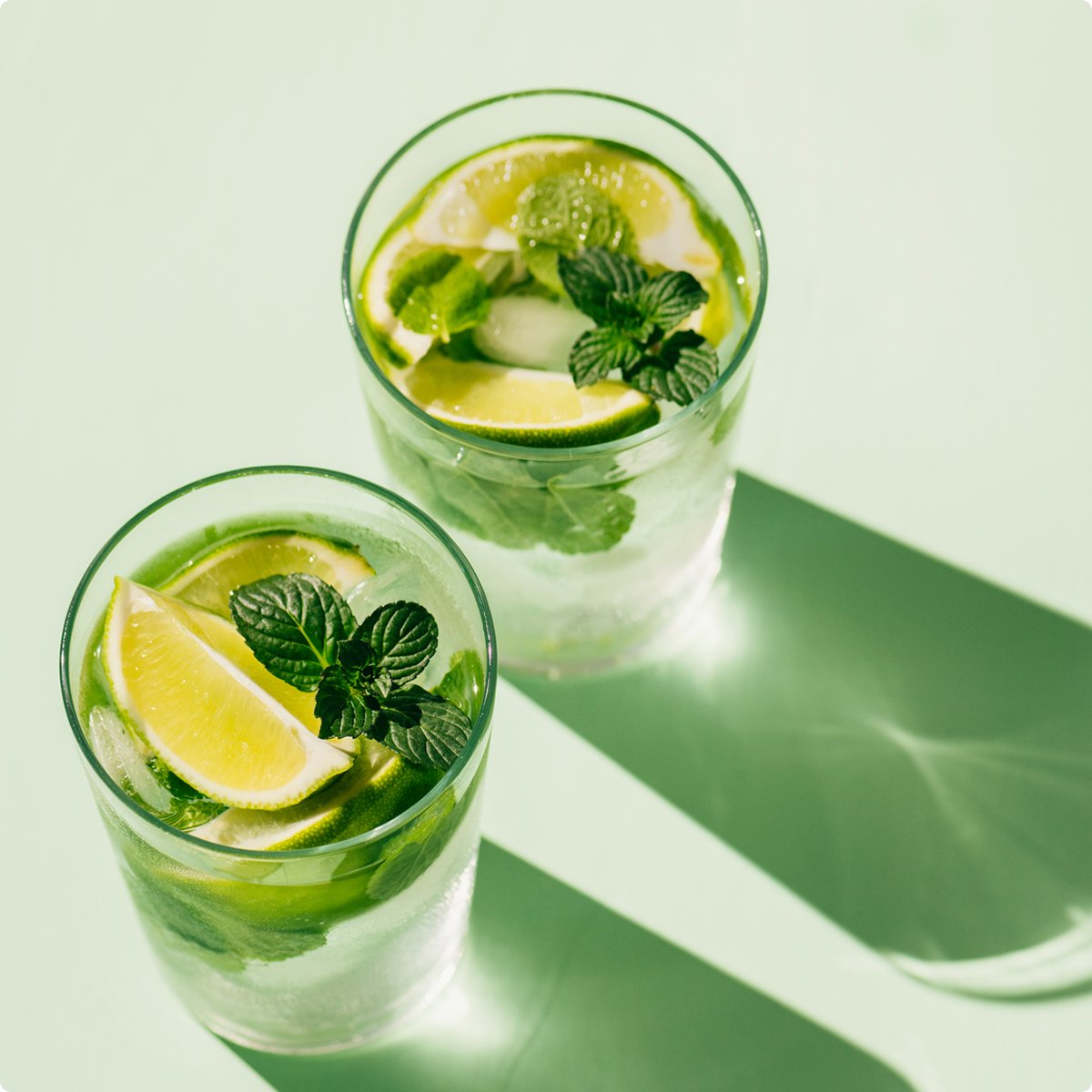 Two mint green cocktails