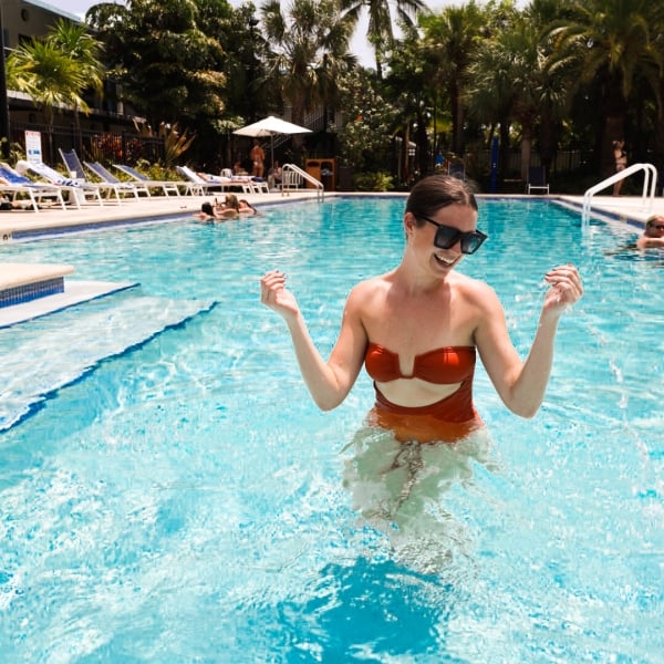 Woman happy in pool
