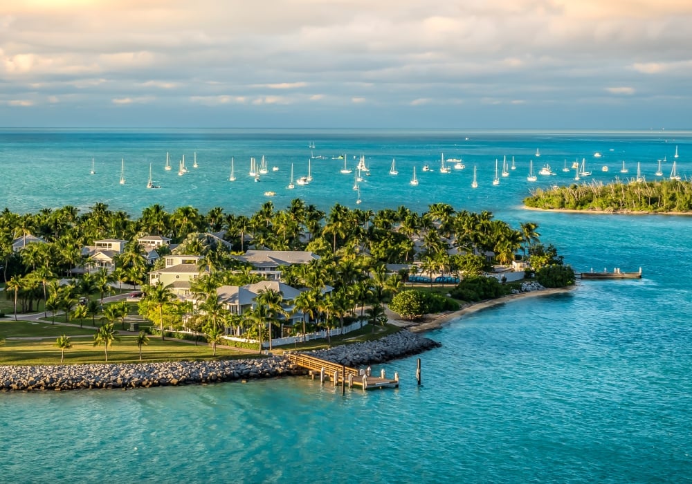 Panoramic sunrise landscape view of the small Islands Sunset Key and Wisteria Island of the Island of Key West, Florida Keys.