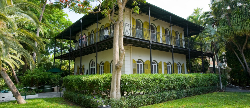 Ernest Hemingway Home and Museum in Key West, Florida, surrounded by lush tropical gardens